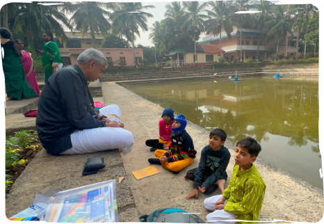 image represent the teacher taking classes in the river step