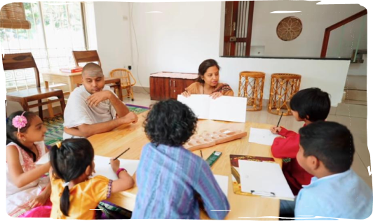 A teacher is teaching Veda classes to the students in a structured manner.